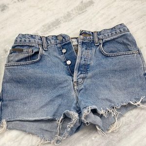 Calvin Klein high waist distressed jean shorts